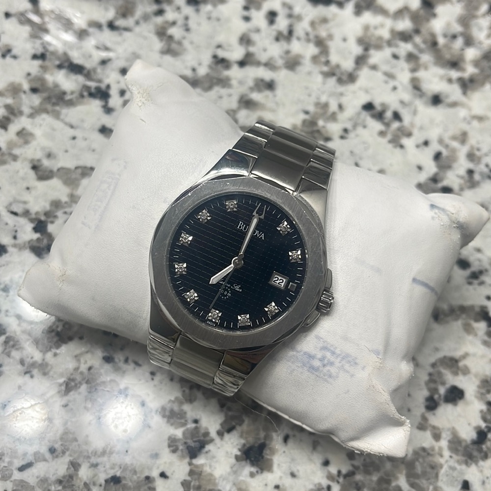 Like new Bulova watch stainless steel. Worn only a couple of times.